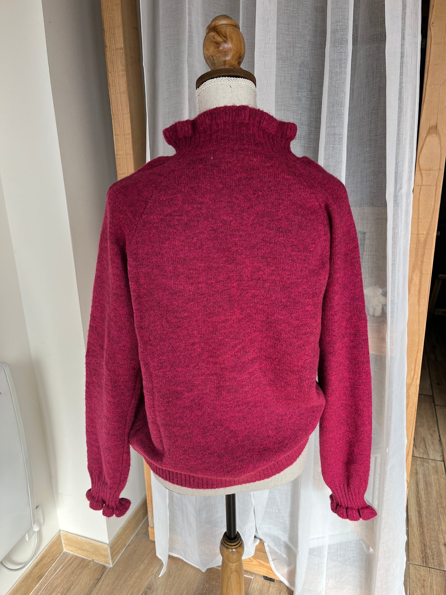 Pull à boutons dorés tout doux